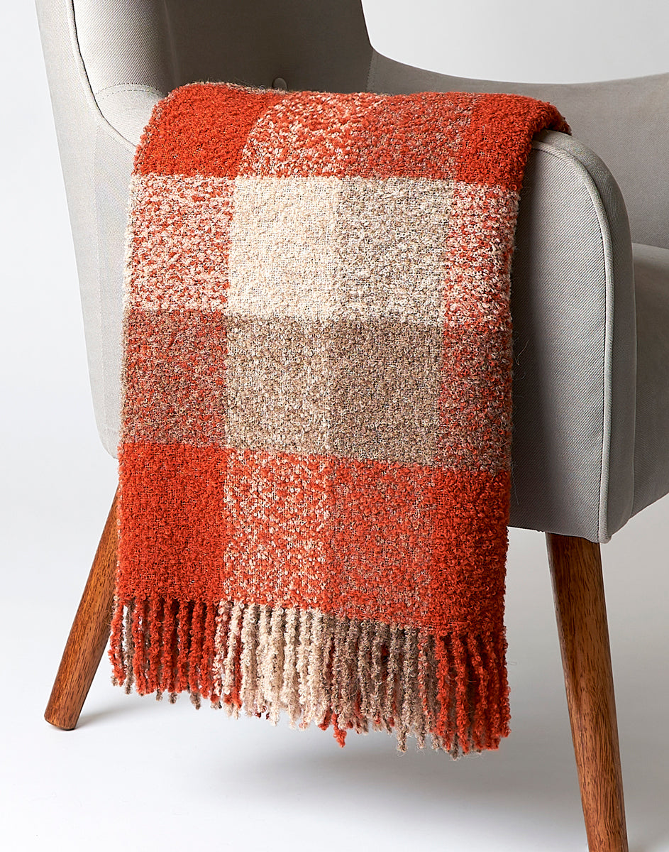 Manta Bouclé naranja y beige — diseño moderno con calidez